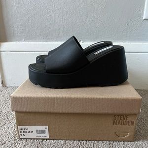 Black leather wedge sandals